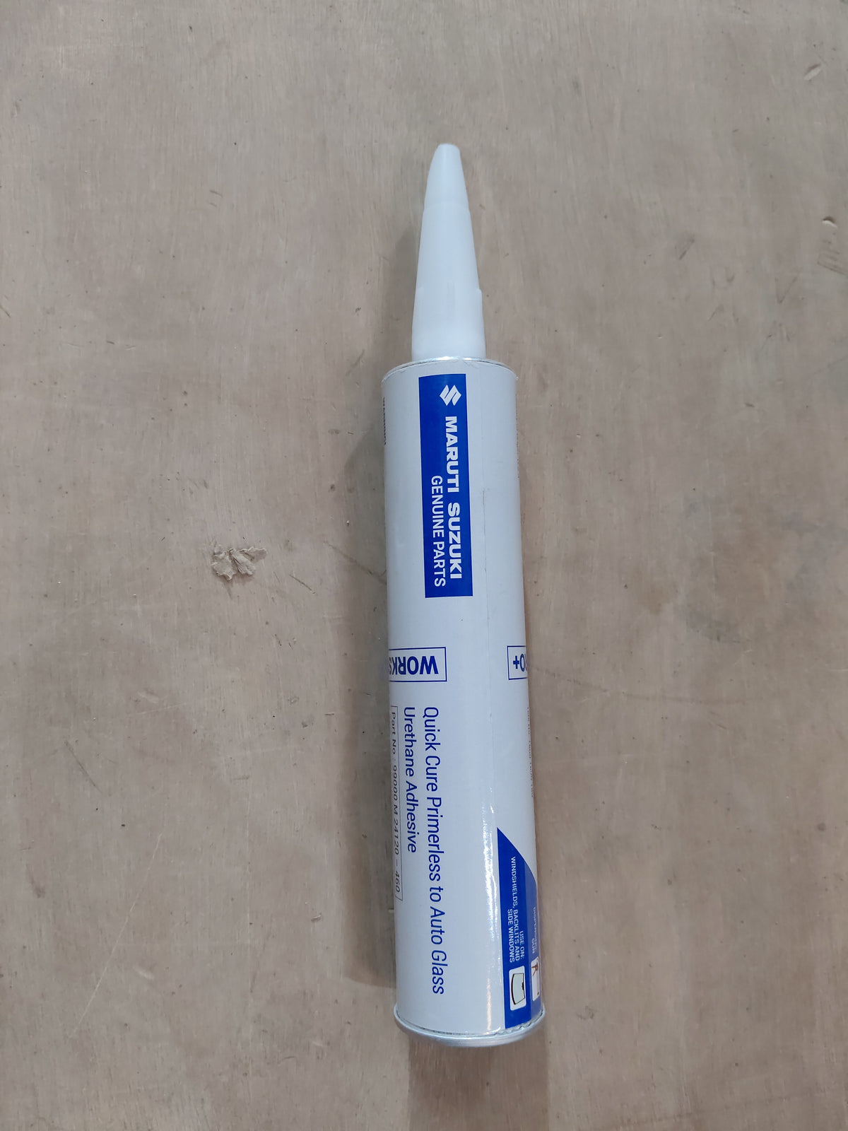 Maruti Suzuki DG Sealant Set without Primer, automotive sealant product in a container, designed for vehicle sealing applications.