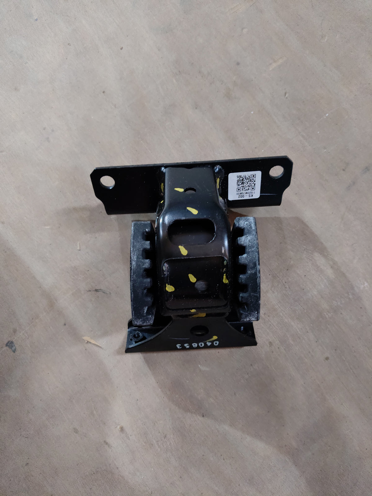 Maruti Suzuki Celerio LH side engine mounting, showing the black rubber and metal components for vehicle stability.