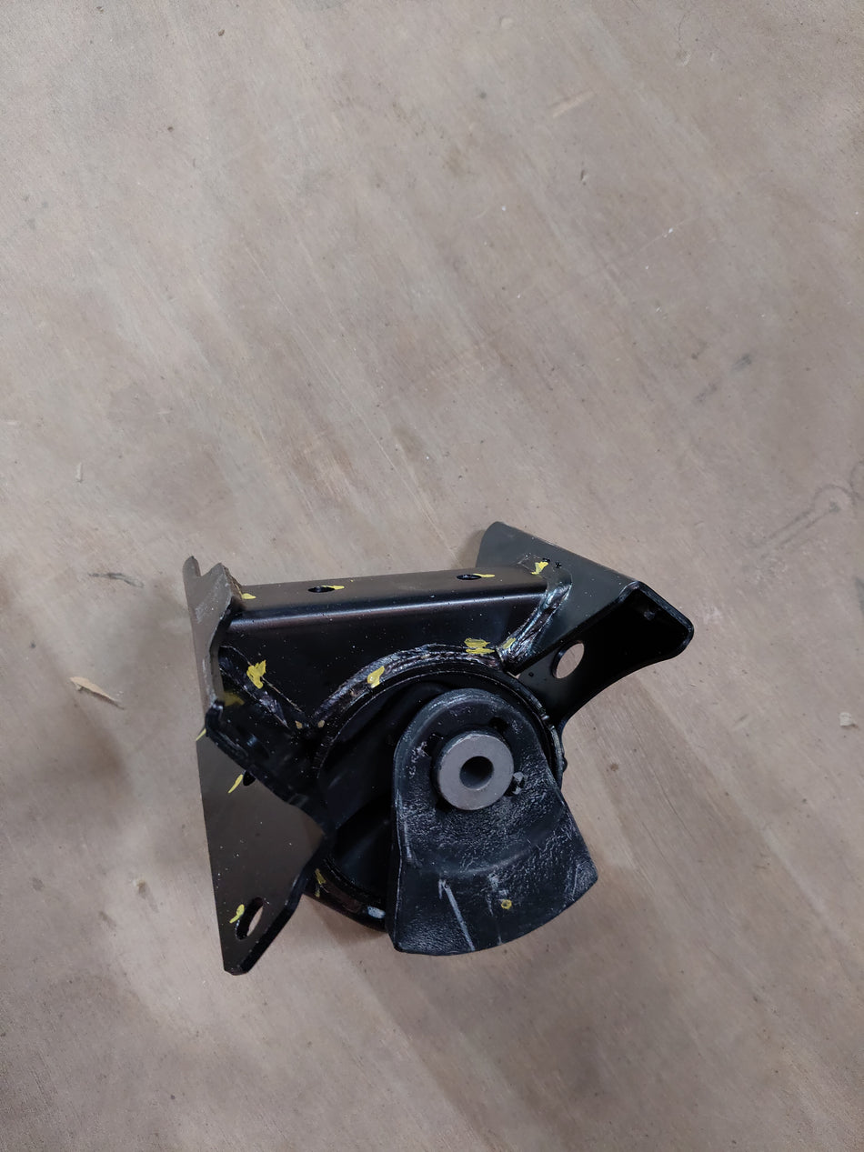 Maruti Suzuki engine mounting for Celerio, LH side, durable automotive part in black with metal components.