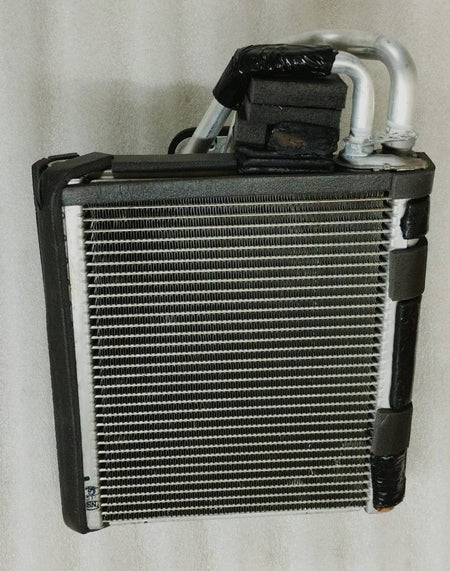 Maruti Suzuki evaporator assembly part 95411M66RC0, shown in a detailed view, for vehicle air conditioning systems.