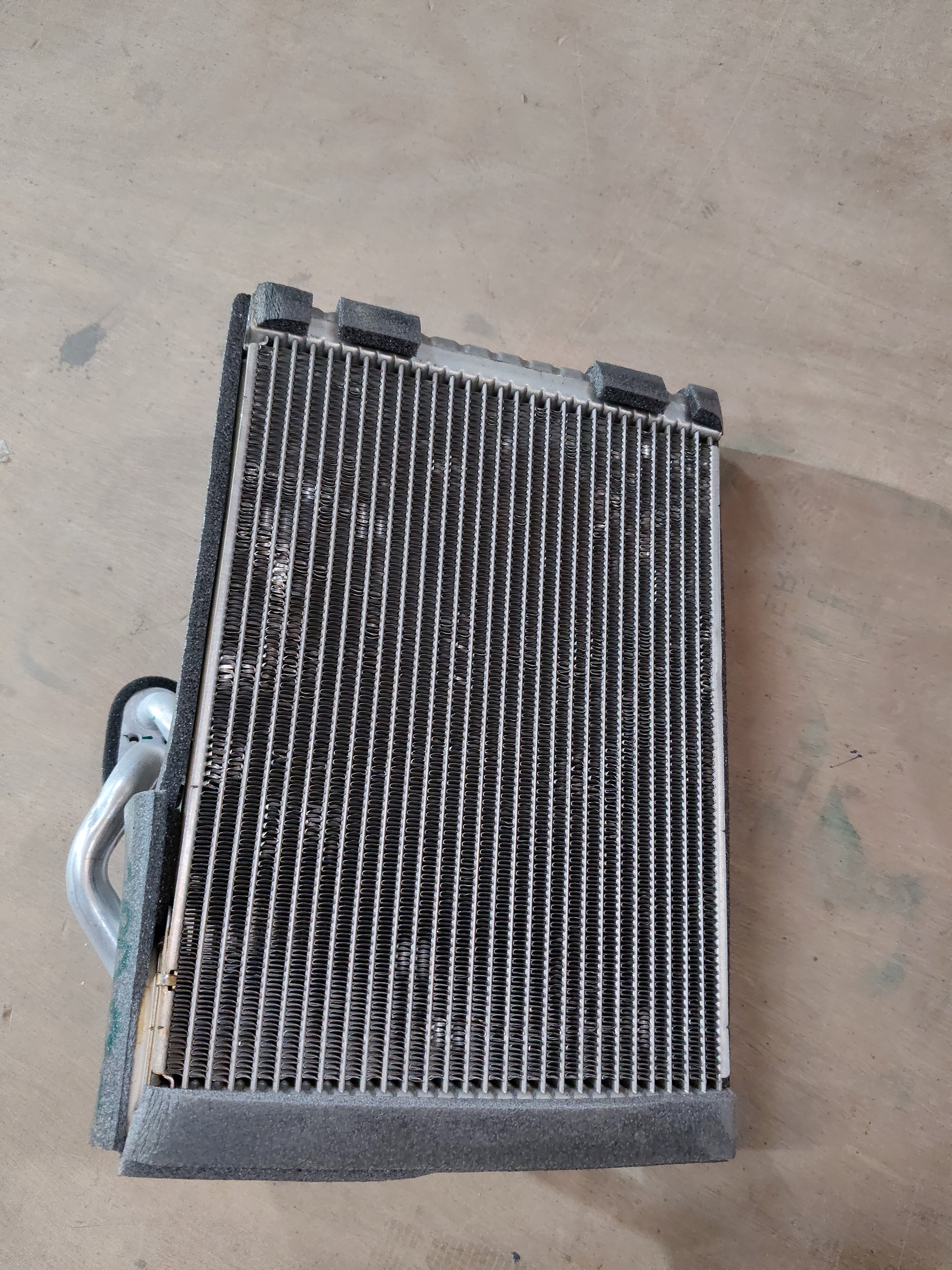 Maruti Suzuki evaporator sub assembly part 95411M56R00 for vehicle air conditioning system.