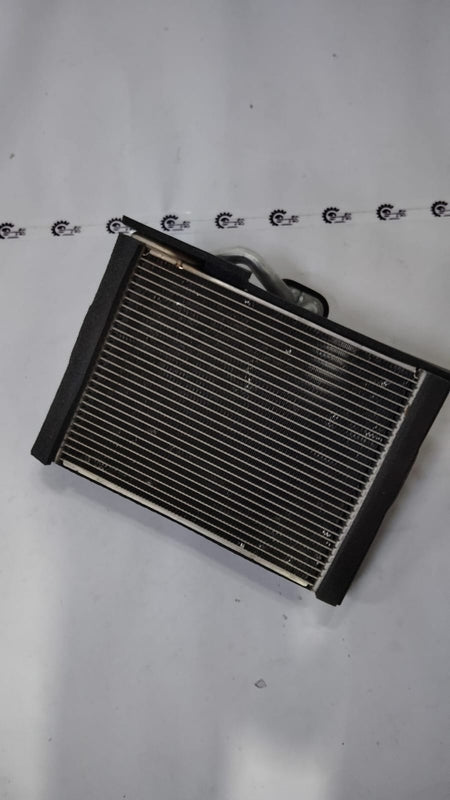 Maruti Suzuki Baleno evaporator sub-assembly, automotive cooling part, model 95411M68P21, for vehicle climate system.