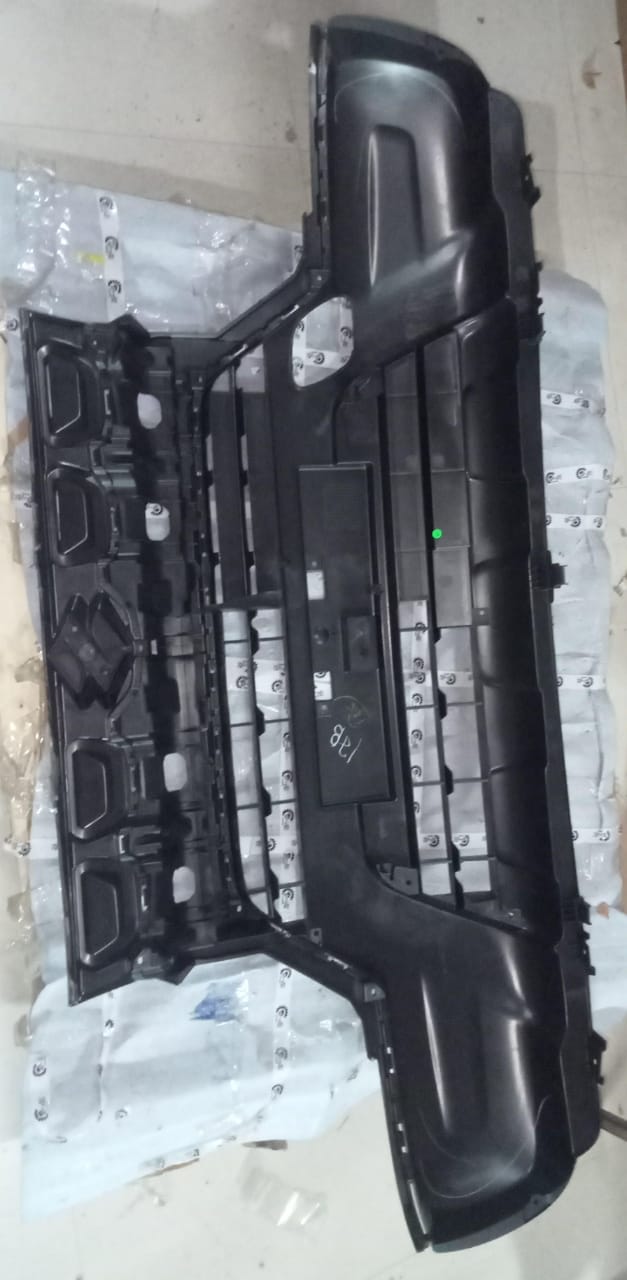 Maruti Suzuki S-Presso front lower bumper part, model 71711M62S005PK, showing the black plastic bumper component.