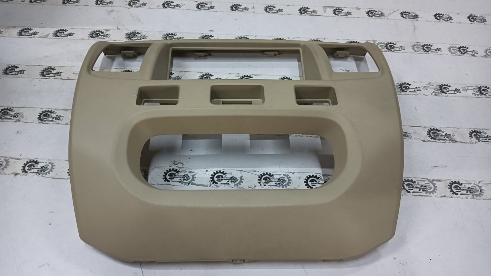 Maruti Suzuki Zen Estilo instrument panel garnish, black plastic trim piece for dashboard decoration.