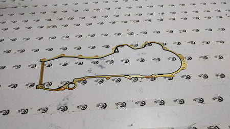 Maruti Suzuki gasket oil pump for Swift and Dzire vehicles, showing a close-up of the mechanical component.