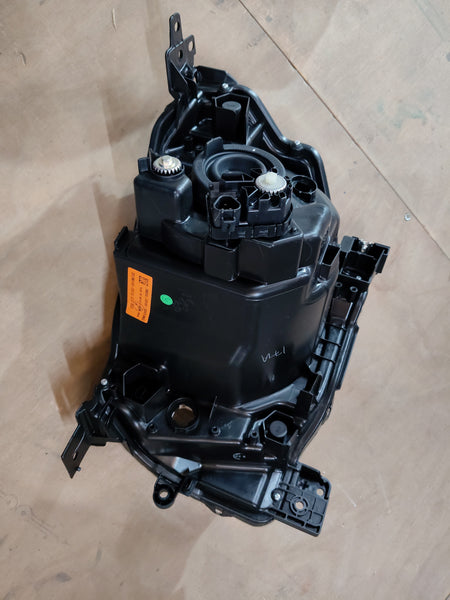 Maruti Suzuki Ignis head lamp assembly, model 35121M66R10, showing the front view of the vehicle's headlight.