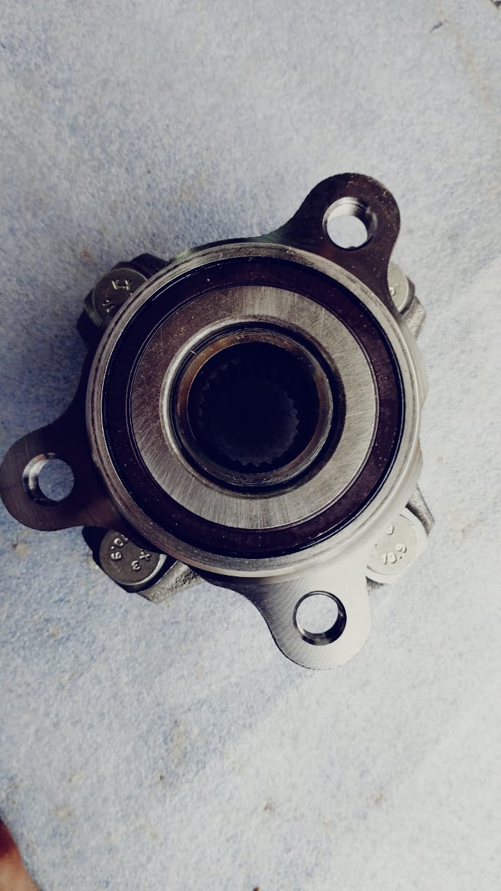 Maruti Suzuki front wheel hub assembly with part number 43401M68P01, showing the hub and wheel mounting area.