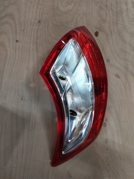 Maruti Suzuki tail lamp for right side, model #35650M74L00, showing the red and clear lens assembly.
