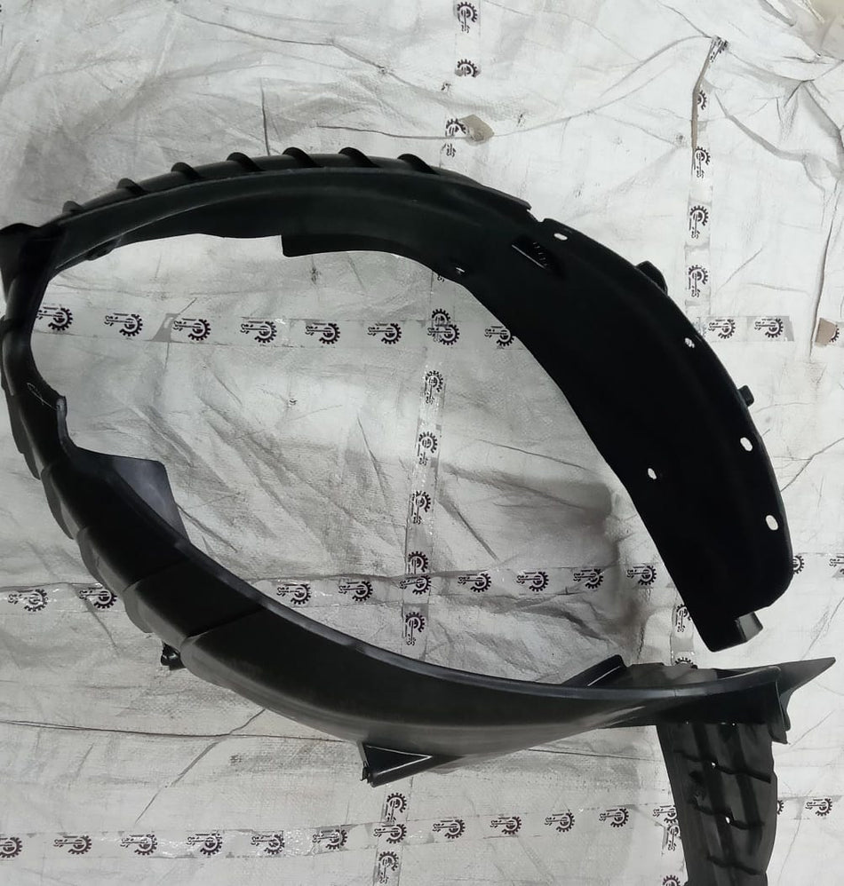 Maruti Suzuki front fender lining component, model L 72480M55R00, shown in a close-up view of the vehicle part.