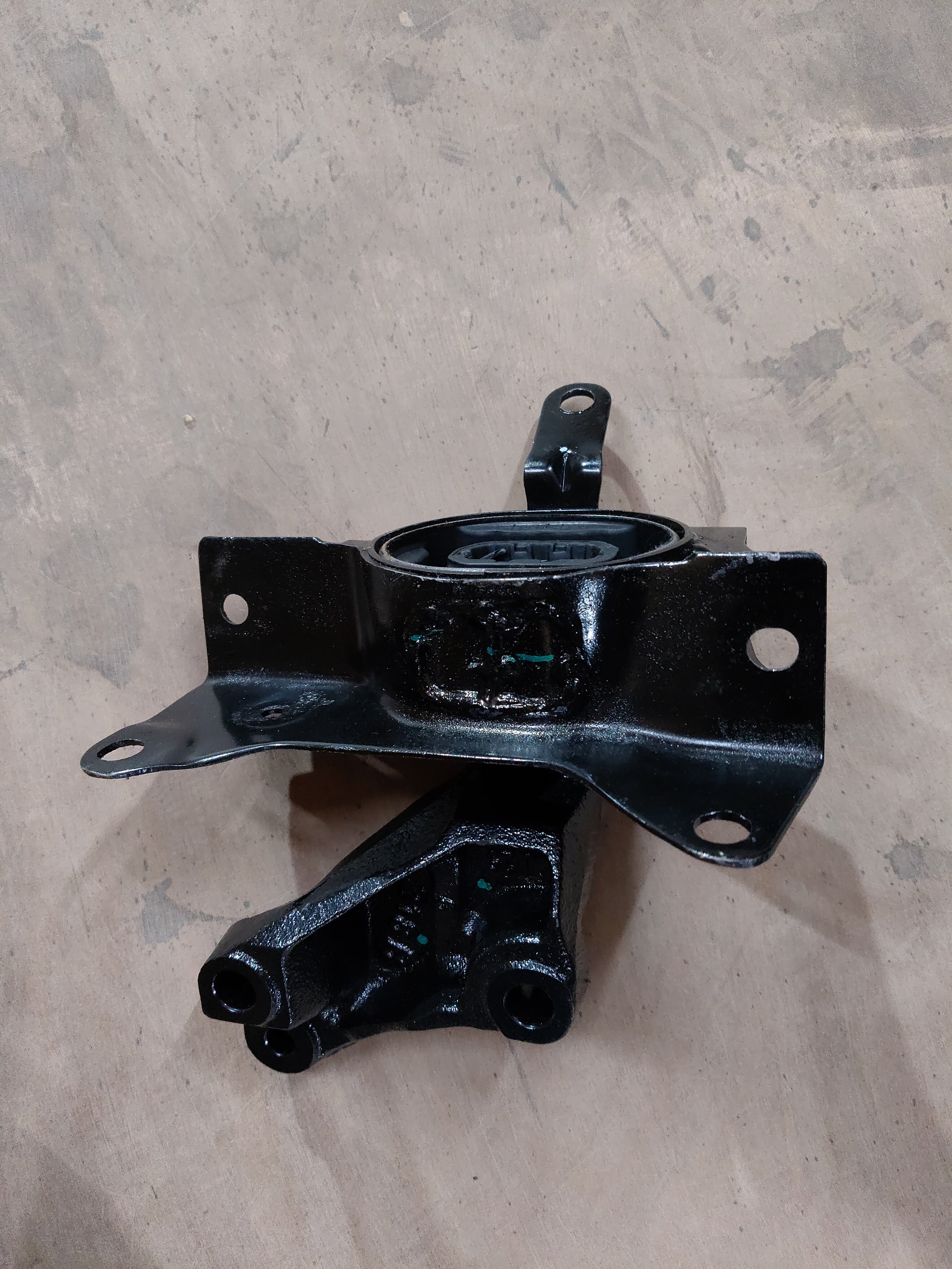 Maruti Suzuki engine mounting component for left side, part number 11620M55RA0, shown in a close-up image.