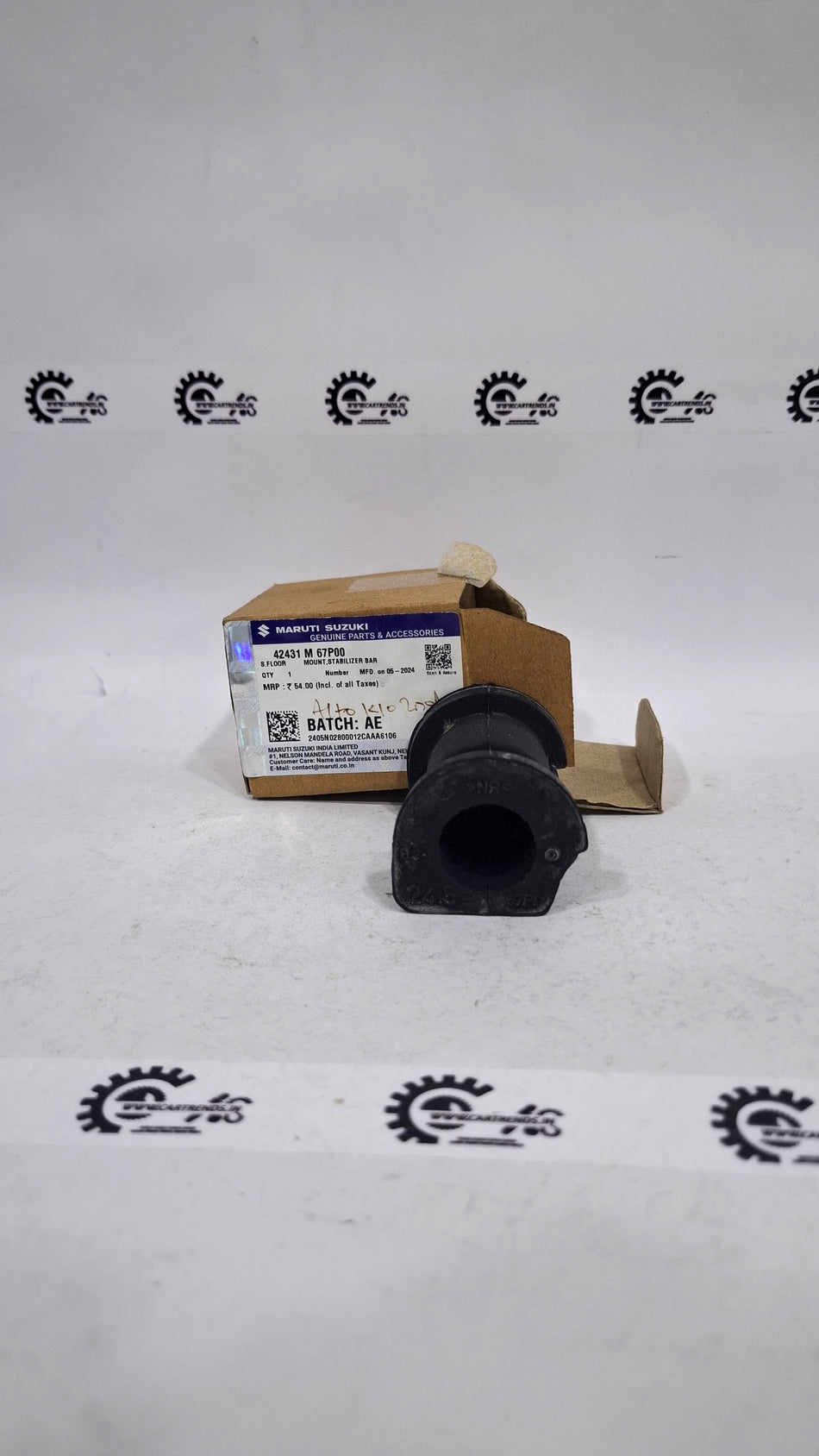 Maruti Suzuki Mount Stabilizer Bar 42431M67P00, automotive suspension component, close-up of the stabilizer bar for vehicle stability.