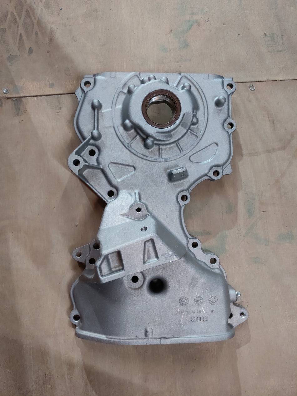 Maruti Suzuki oil pump assembly for Wagon R Type 2, showing the detailed metal component with mounting points and pump mechanism.