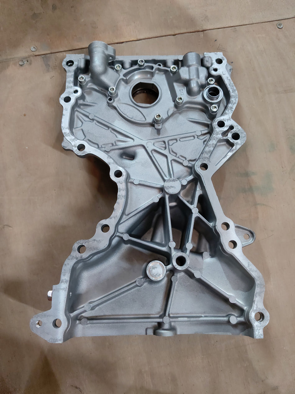 Maruti Suzuki WagonR Type 2 oil pump, automotive engine part, close-up view showing metal components and pump mechanism