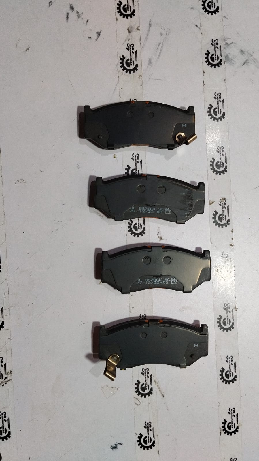 Maruti Suzuki pad set 55810M55R01, automotive brake pads with packaging, designed for Maruti Suzuki vehicle maintenance.