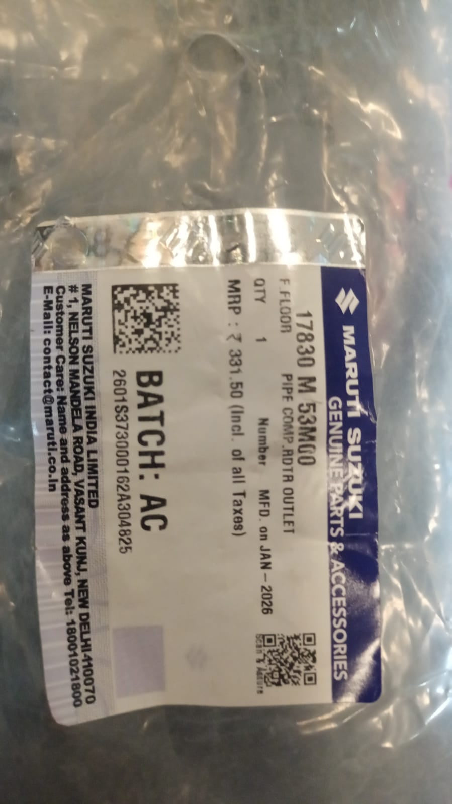 Maruti Suzuki pipe compressor outlet 17830M53M00, automotive replacement part, shown in close-up with metal finish and connection end