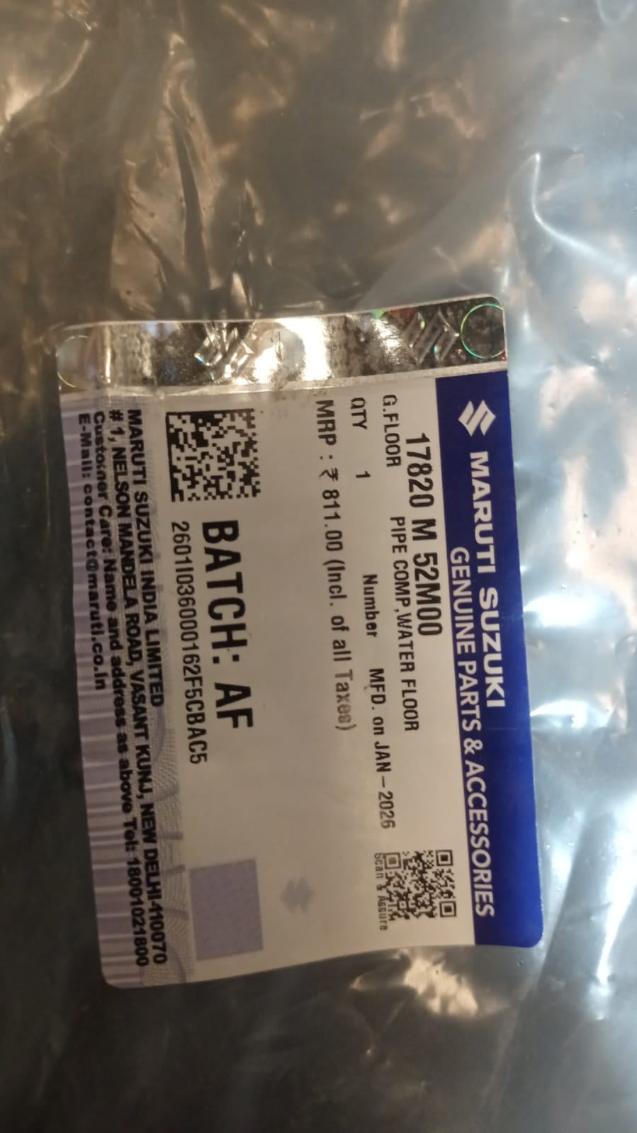 Maruti Suzuki floor water pipe component, part number 17820M52M00, showing the black plastic pipe with connectors.