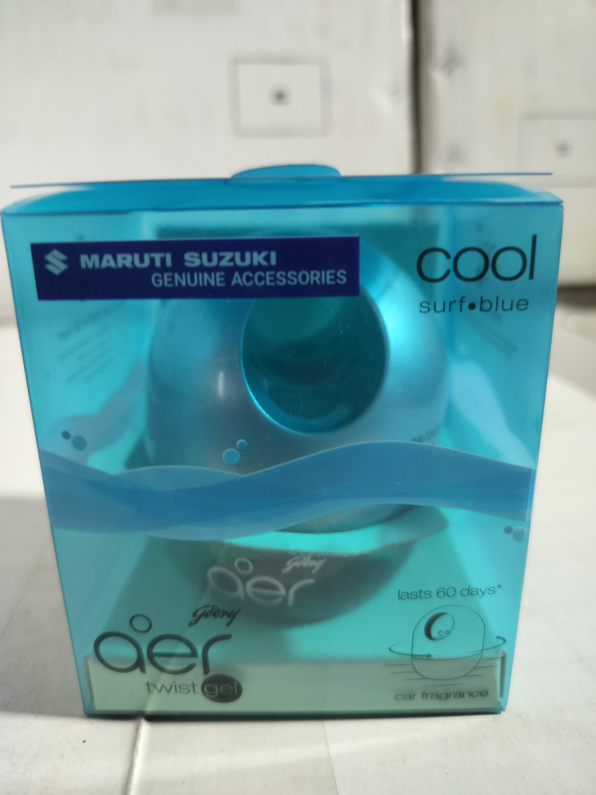 Maruti Suzuki Prf d/Brd gel Cool Surf Blue for car dashboard, featuring blue gel material with Maruti Suzuki branding visible.