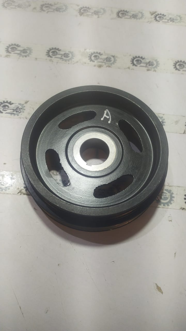 Maruti Suzuki pulley crankshaft part for Baleno, with visible pulley and crankshaft components in a detailed automotive image.