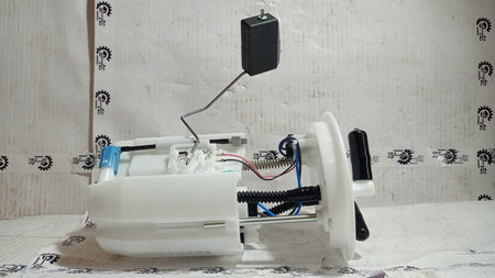 Maruti Suzuki fuel pump assembly labeled 15100M68PA5, automotive part for Maruti Suzuki vehicles.