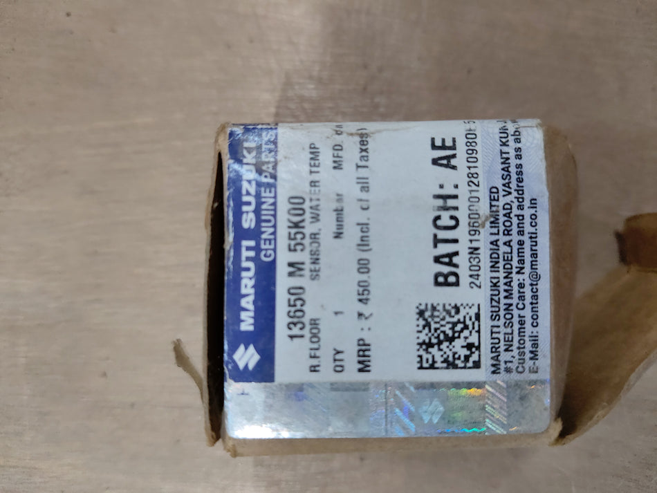 Maruti Suzuki water temperature sensor 13650M55K00 for vehicle cooling system, shown in close-up with wiring connection.