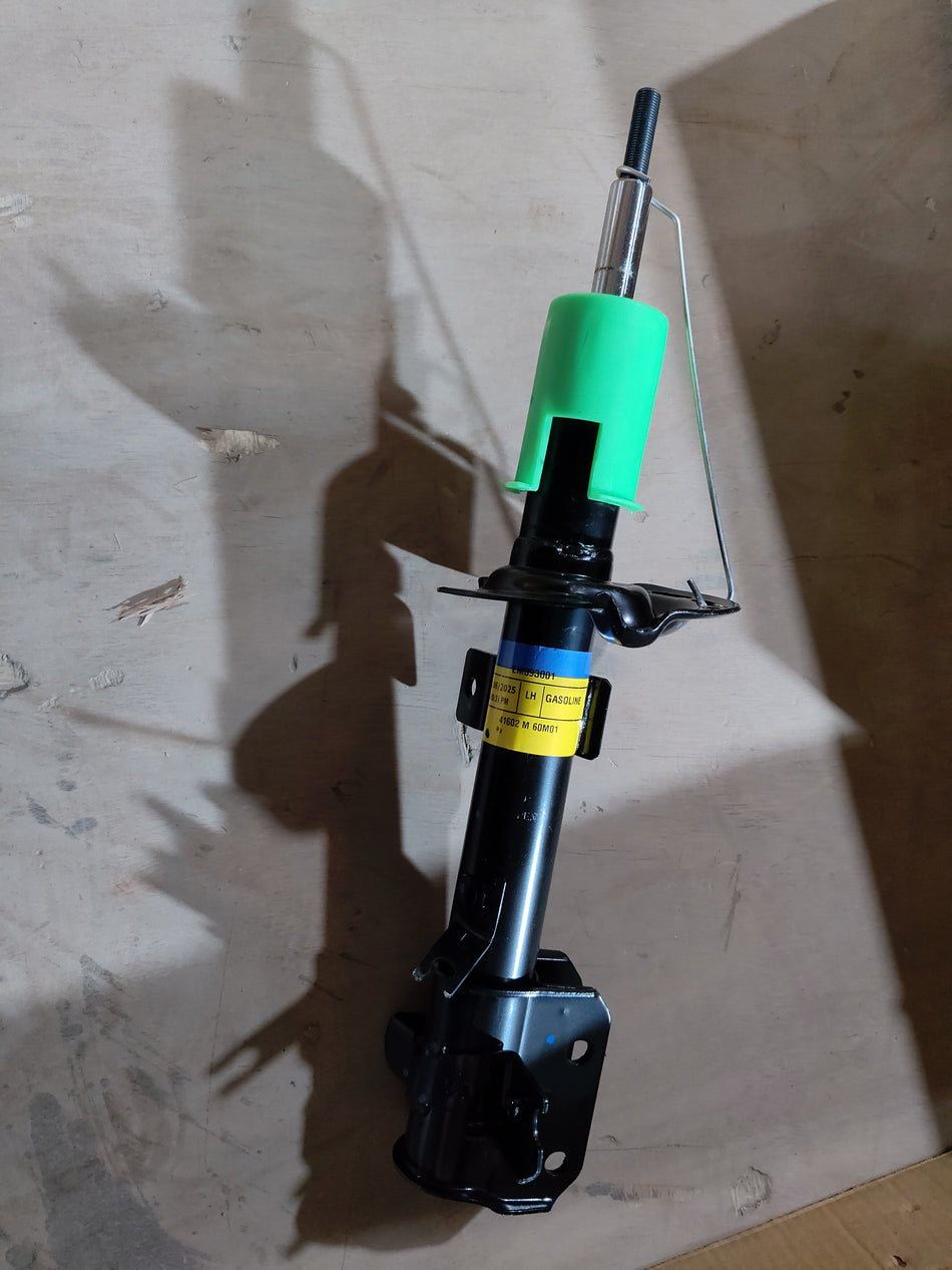Maruti Suzuki front strut assembly, part number 41602M60M01, showing the suspension component for vehicle stability.