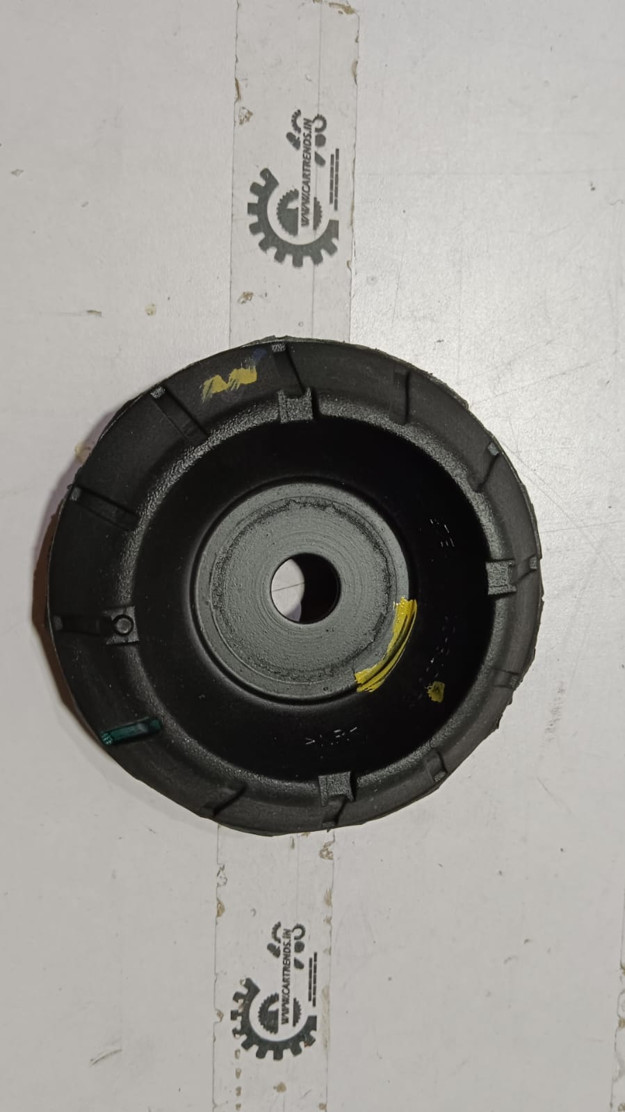 Maruti Suzuki support front strut 41710M69R00, automotive suspension component for vehicle stability and handling.