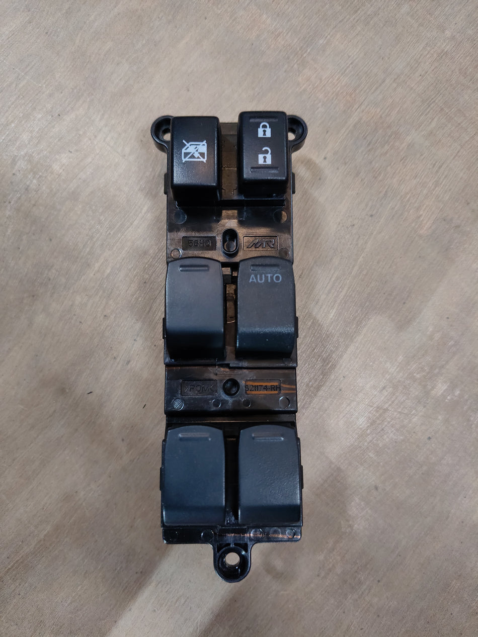 Maruti Suzuki power window switch assembly, automotive part, with electrical components and button interface.