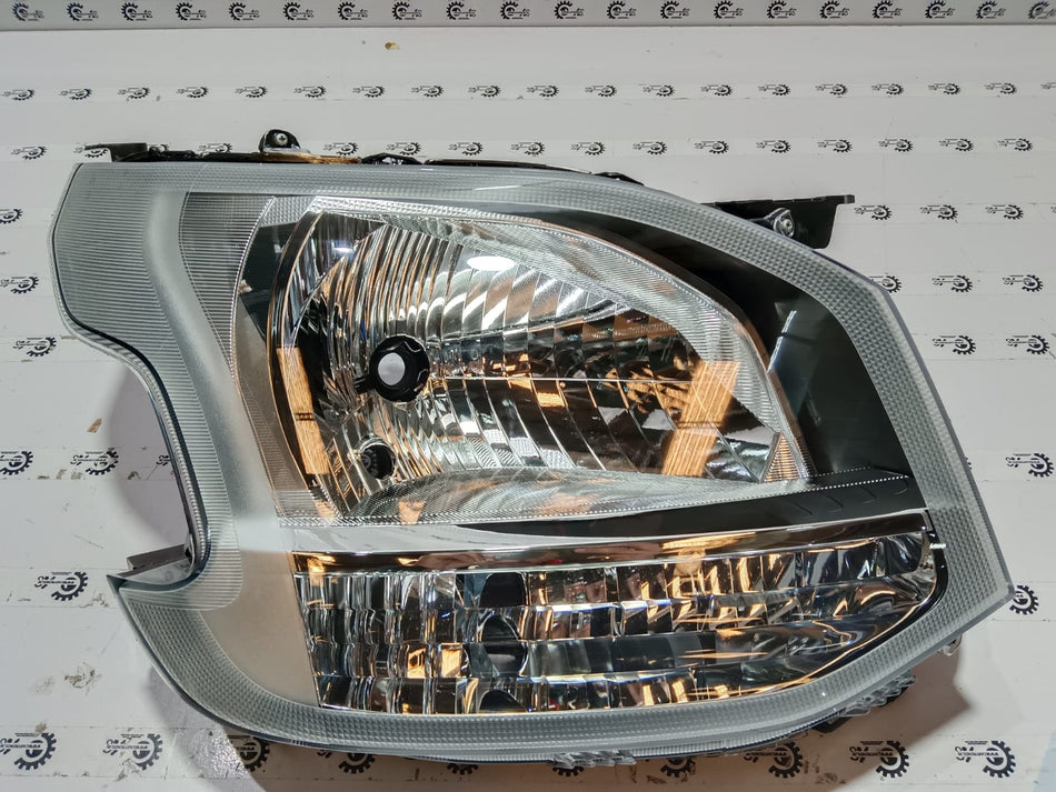 Maruti Suzuki unit headlamp RH 35121M69R00, car headlight showing clear lens and reflective interior for vehicle illumination.