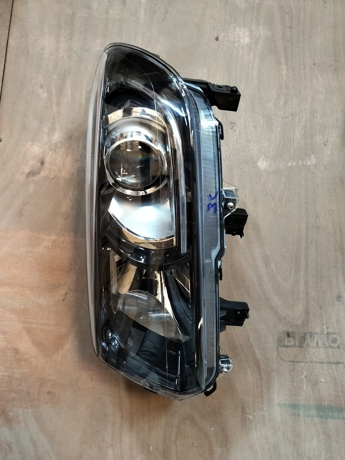 Maruti Suzuki Vitara Brezza petrol headlamp unit LH for model 35321M82P13, showing the automotive headlight assembly.