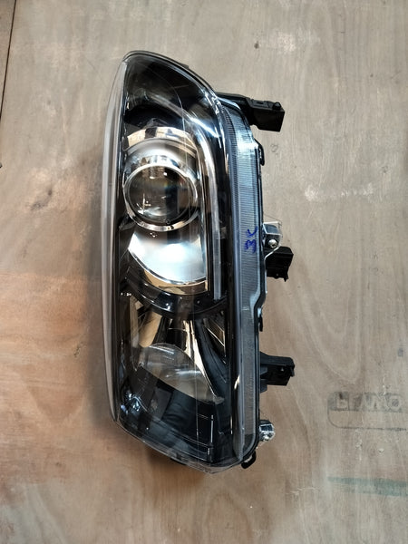 Maruti Suzuki Vitara Brezza petrol headlamp unit LH for model 35321M82P13, showing the automotive headlight assembly.