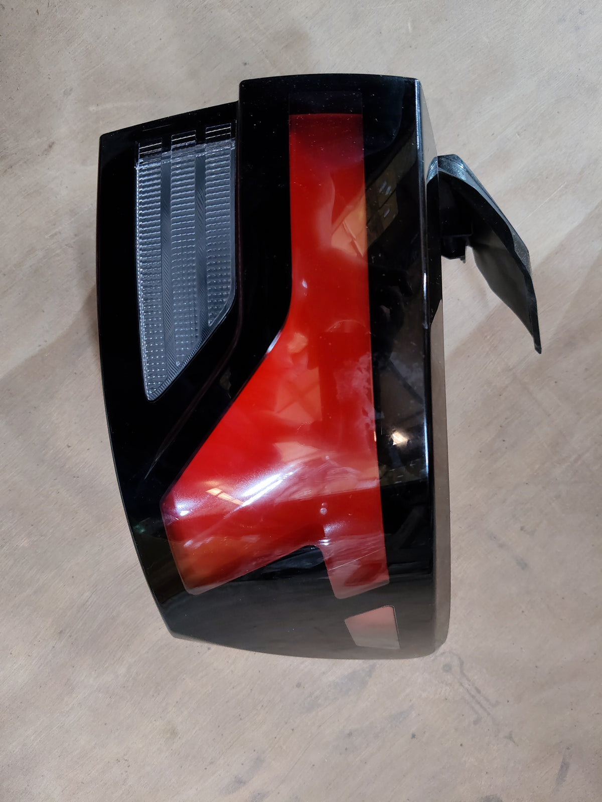 Maruti Suzuki tail lamp for Vitara Brezza, right rear side, clear lens with red and white sections, vehicle lighting component