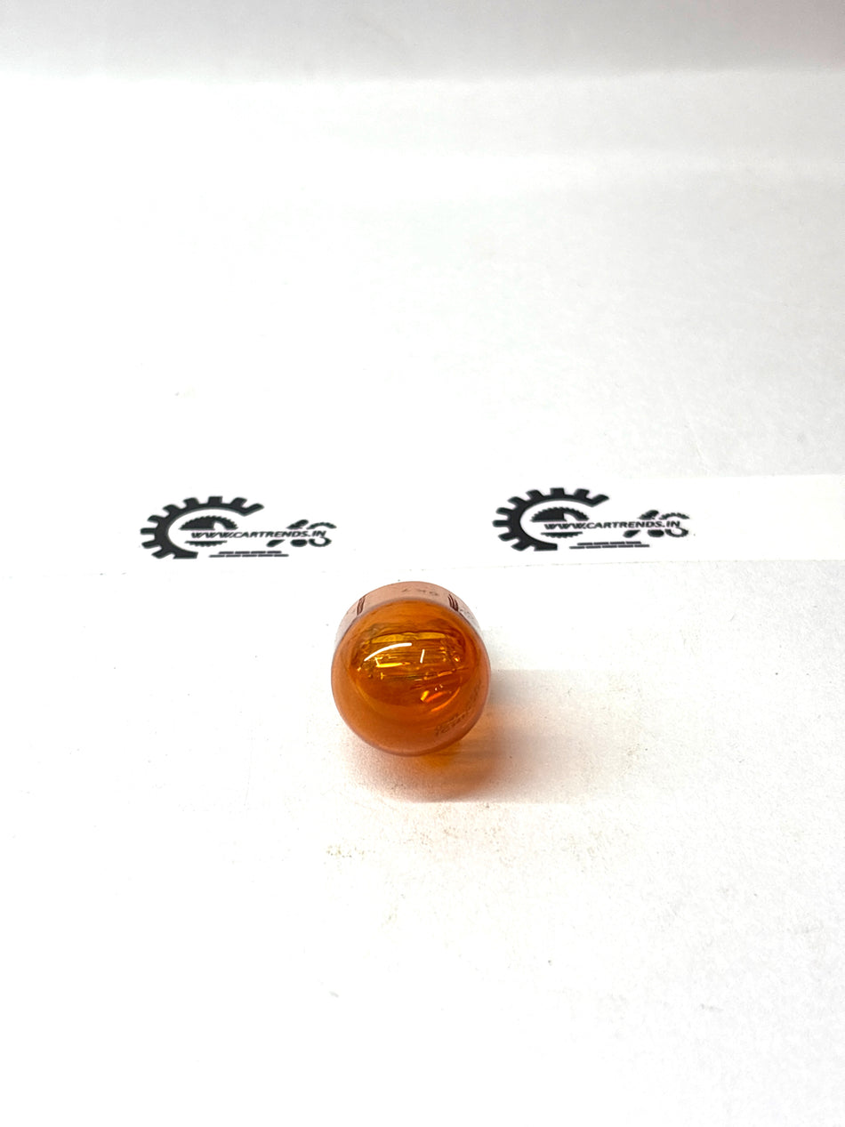 Universal Nissan RH bulb, automotive light replacement part, showing the bulb with clear glass and metal base.