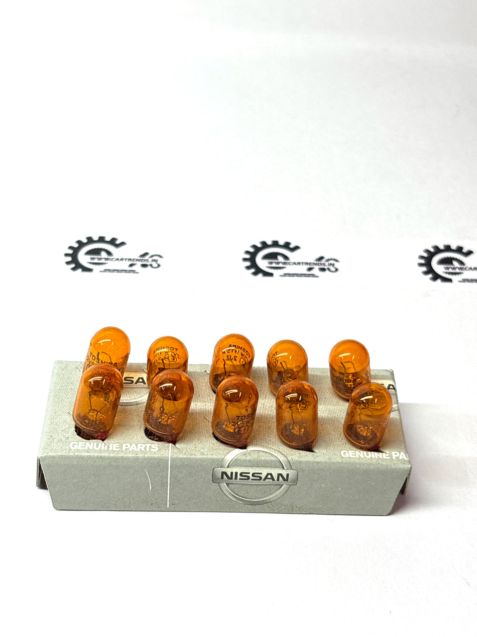 Universal wedge base bulb from Nissan, showing a close-up of the small, clear bulb with metal contacts and plastic base.