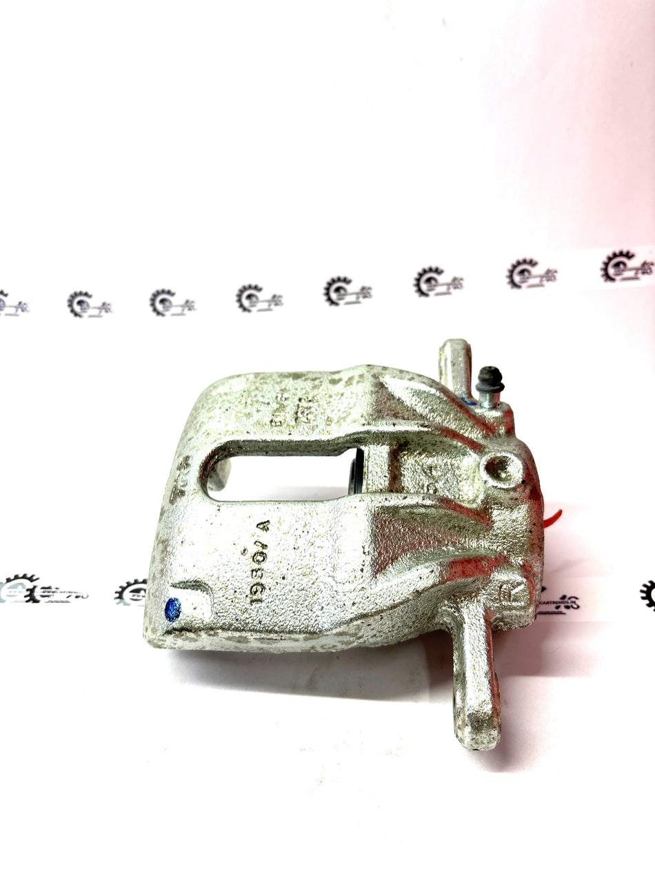 Nissan Micra caliper assembly part #410011HA0B, automotive brake caliper for vehicle braking system.