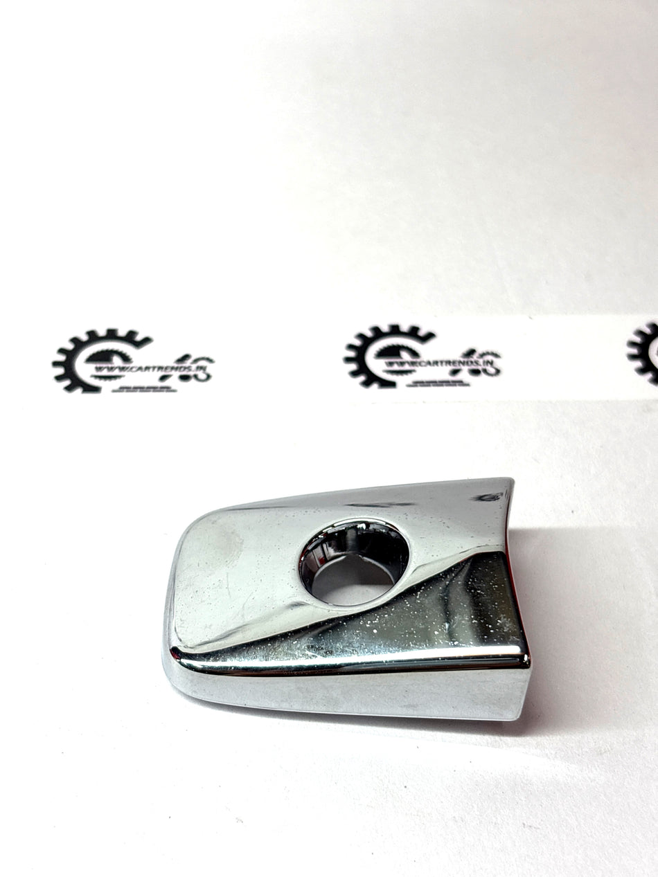 Nissan outside escutcheon with the part number 806451AA0A, showing a close-up of the black exterior car trim piece.