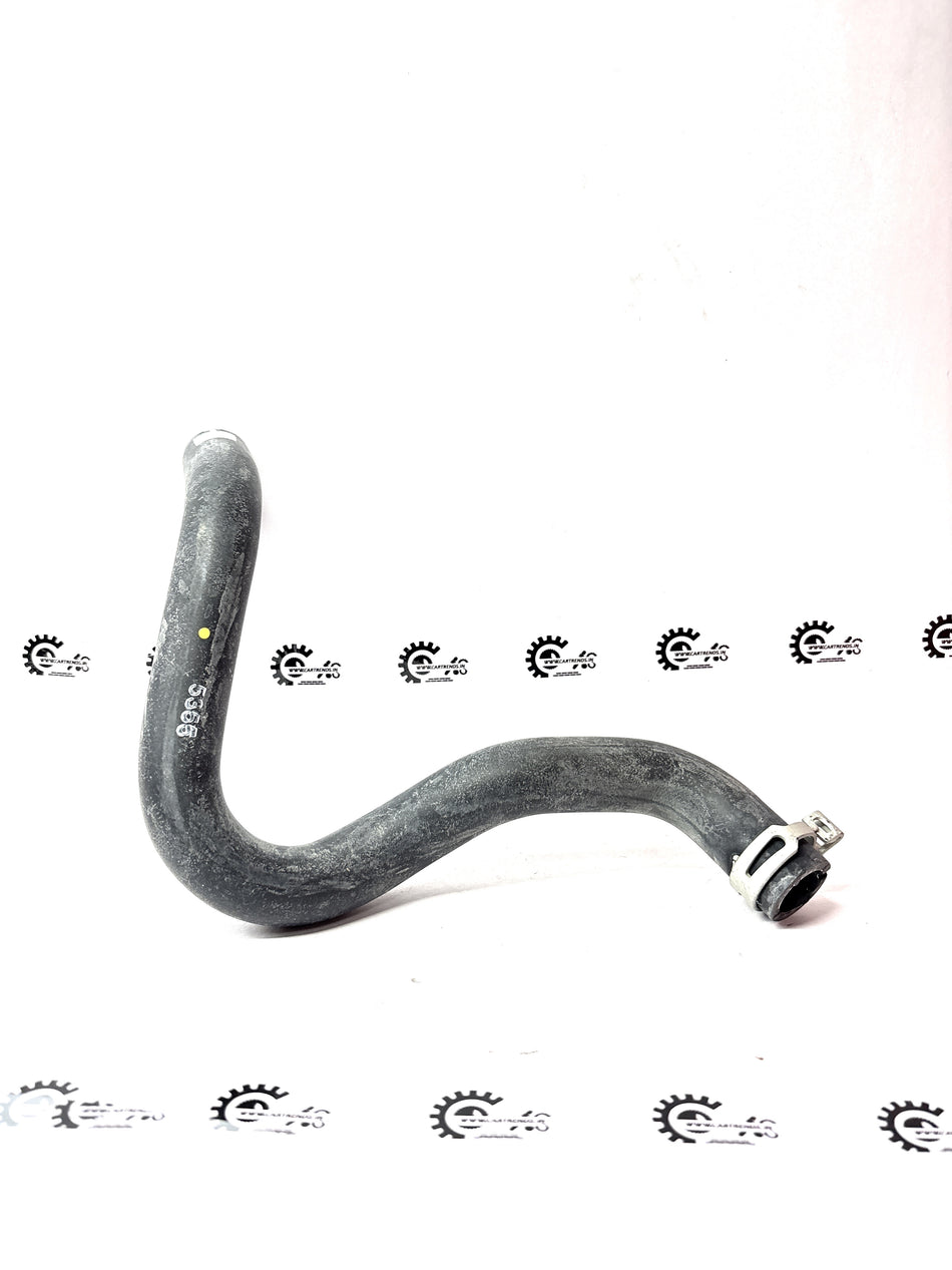 Nissan heater radiator pipe for Renault vehicle, part number 6001548474, shown connected to the cooling system.