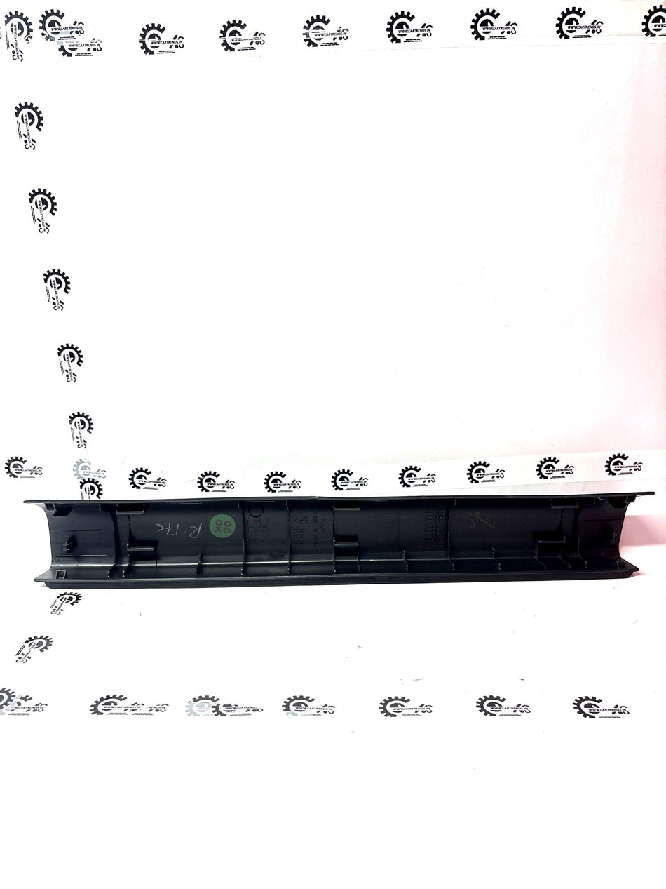 Nissan Micra kick plate assembly in black with silver NISSAN logo, mounted on car door threshold area.