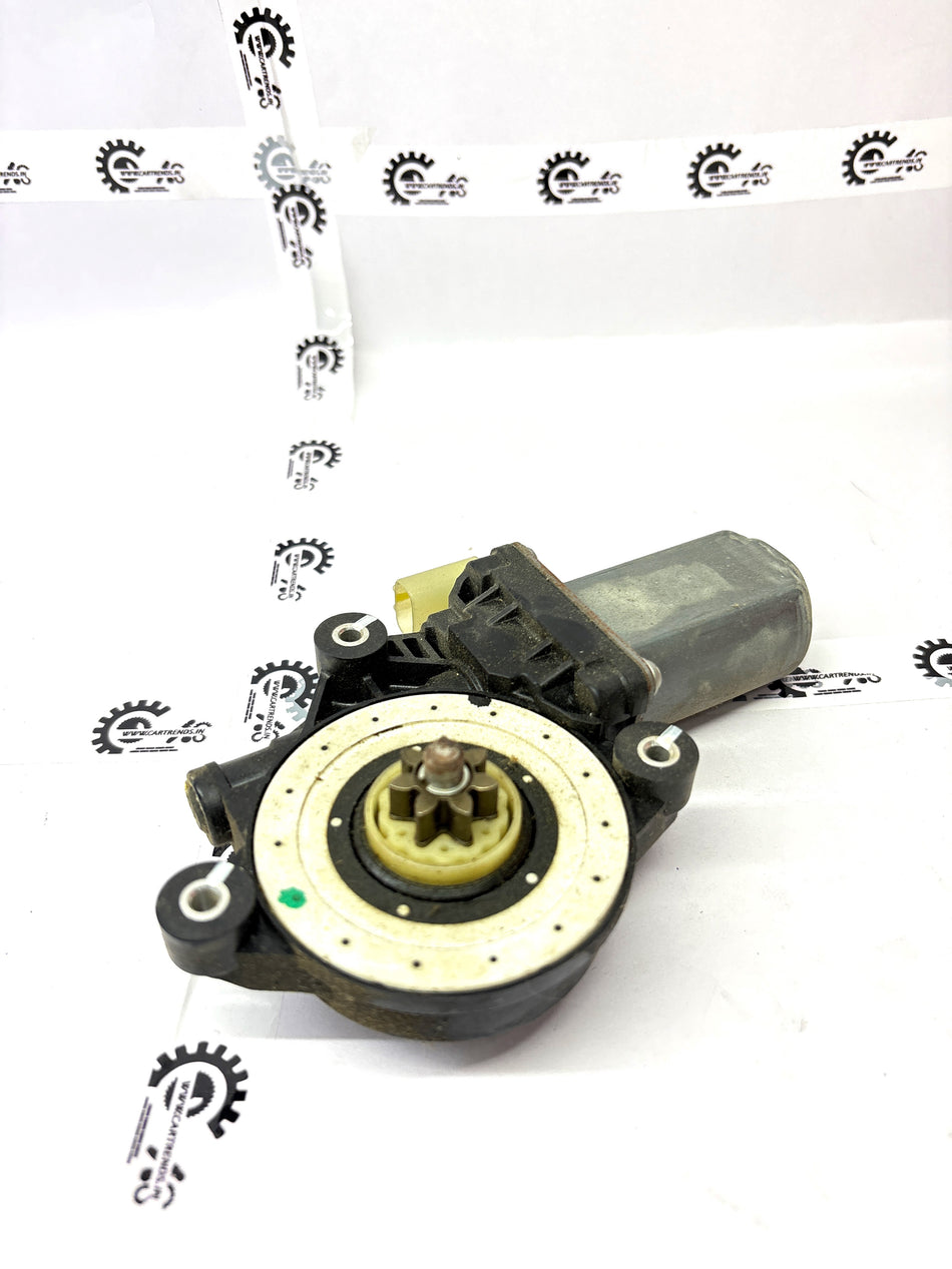 Nissan Micra regulator motor assembly, part number 827301HB0A, showing the electrical components and mounting bracket.