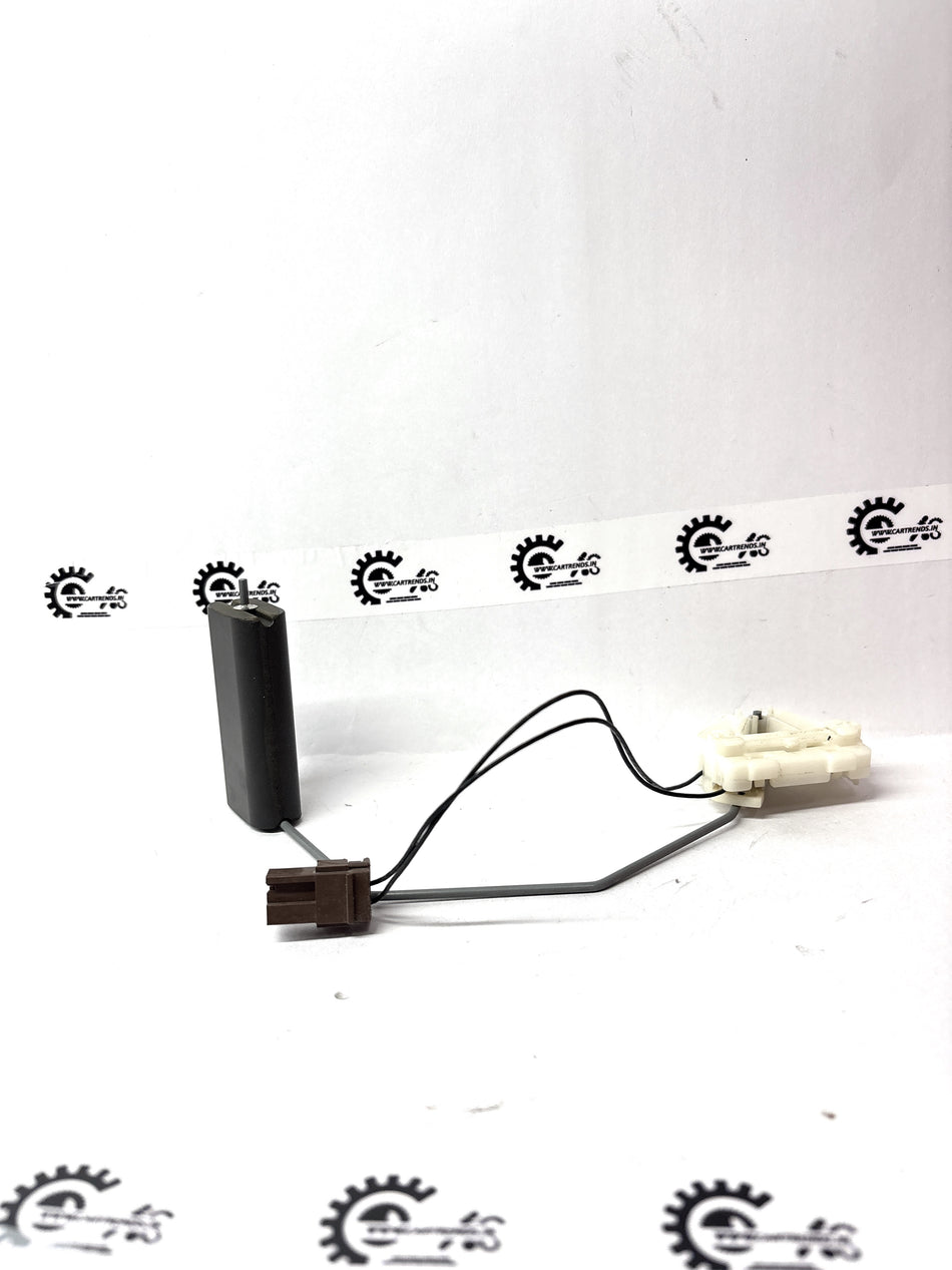 Nissan Micra sender unit part 250601HJ1A, automotive sensor component installed in the vehicle's electrical system