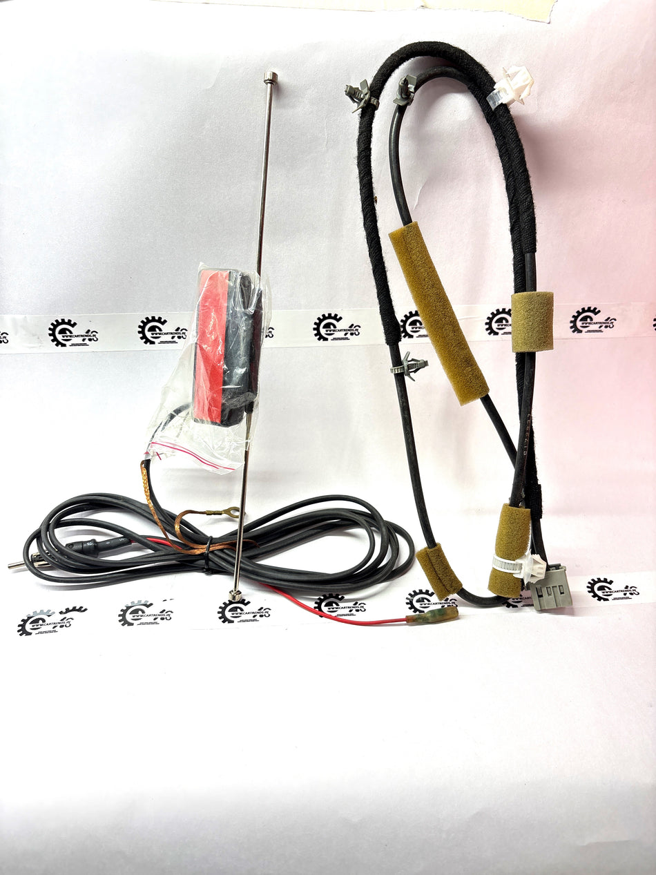 Nissan Micra or Sunny feeder antenna, black plastic car radio antenna for improved signal reception, branded NISSAN.