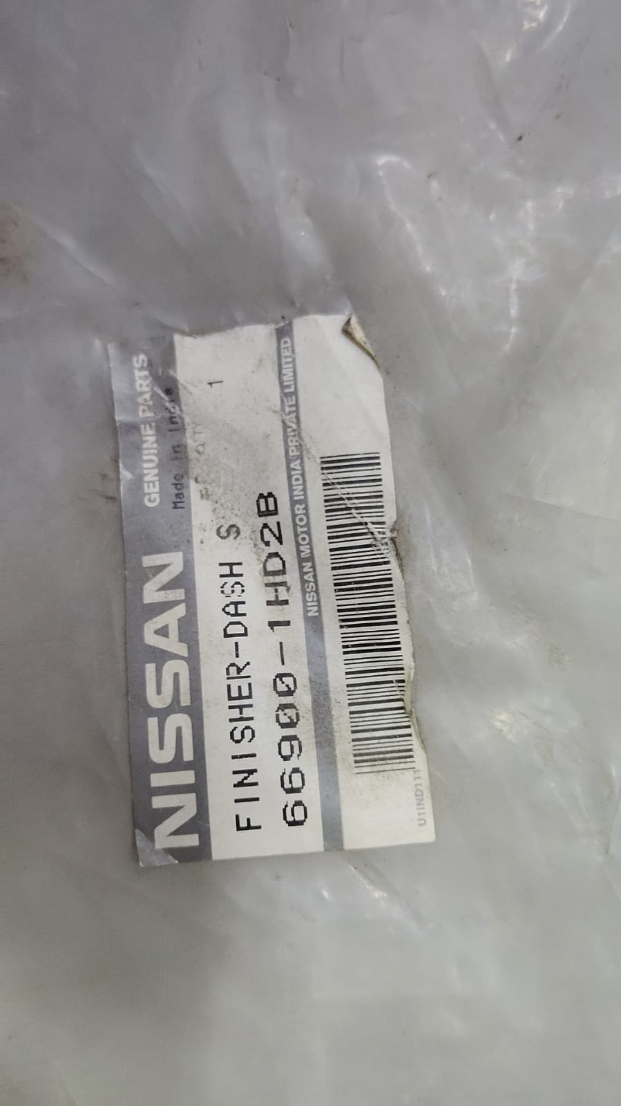 Nissan Dashboard Finisher Pulse 669001HD2B for Nissan vehicles, showing close-up of the sleek, textured interior trim.