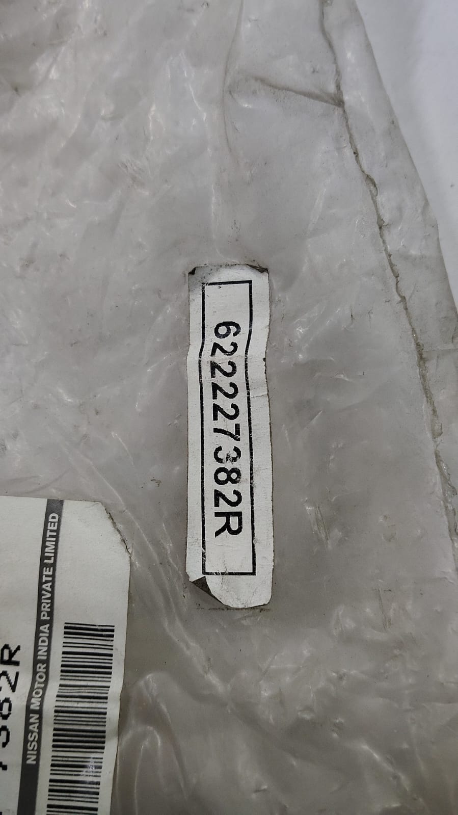Nissan Terrano front bumper bracket, part number 622227382R, showing the black metal support for vehicle's front bumper.