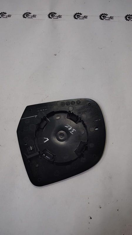 Nissan Micra right-hand side mirror glass replacement, compatible with Nissan vehicles, showing a clear reflective surface.