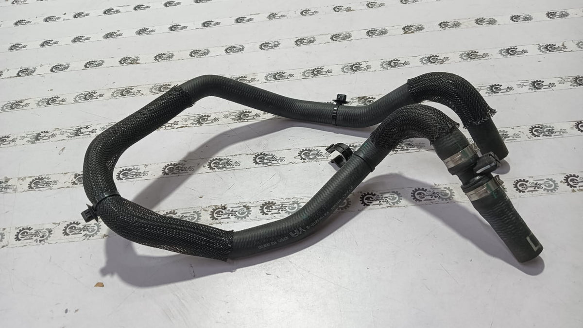 Nissan heater radiator pipe, compatible with Renault, part number 924104921R, close-up view showing pipe and connector details.