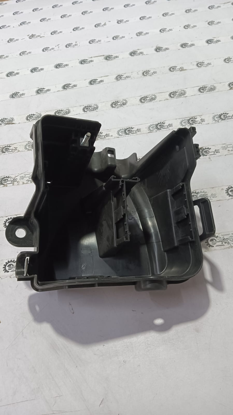 Nissan Duster relay under base, automotive part, with visible relay component for vehicle electrical system.