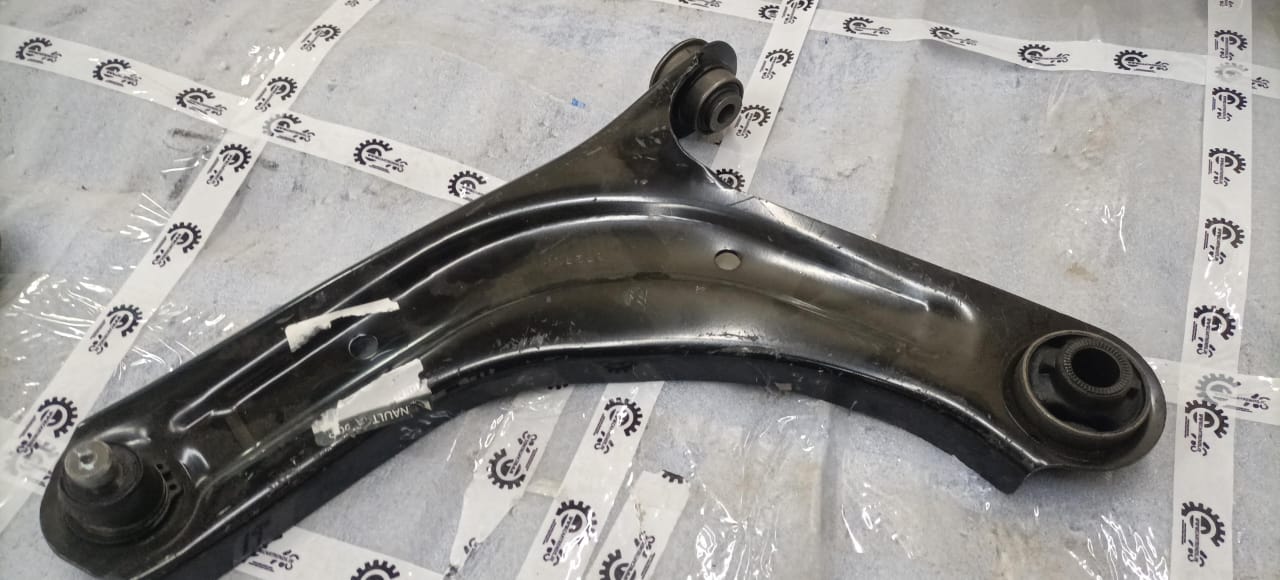 Nissan front lower arm transverse for Renault, vehicle suspension part, showing the metal arm with mounting points