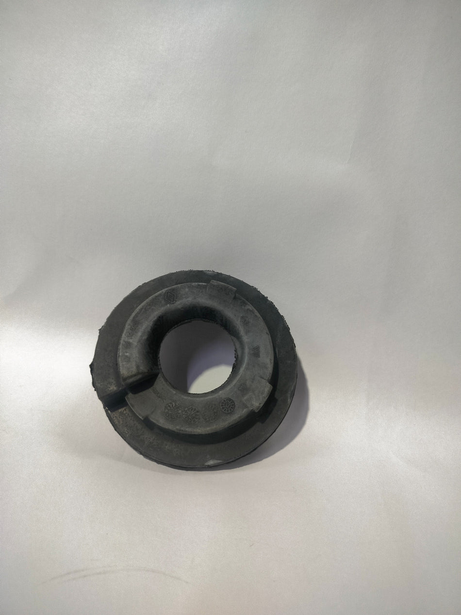 Nissan suspension spring for Renault Logan, part number 6001547495, showing a close-up of the coil spring in a neutral setting.