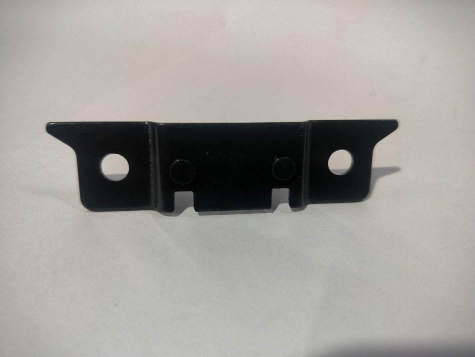 Nissan Micra G-Box Striker part, vehicle component, mounted on the car’s front end, in a close-up view.