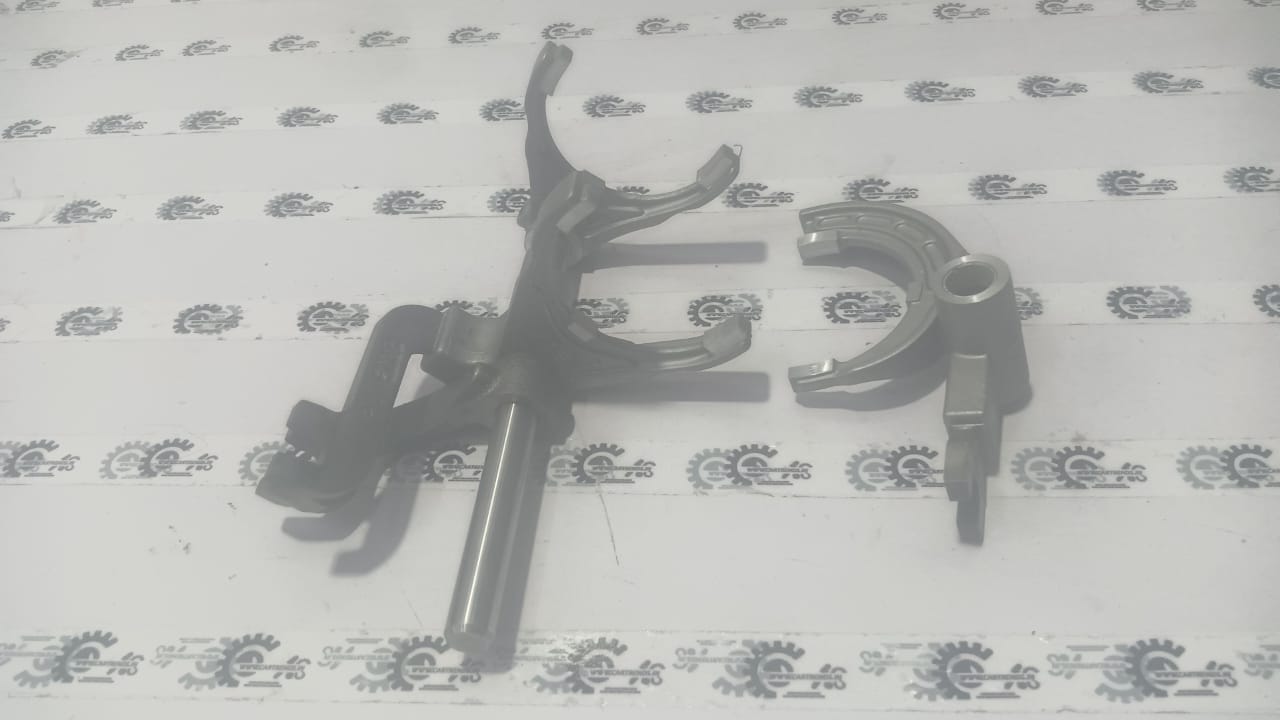 Nissan Magnite gear selector shift rail, automotive transmission part, black metal component with mechanical details.