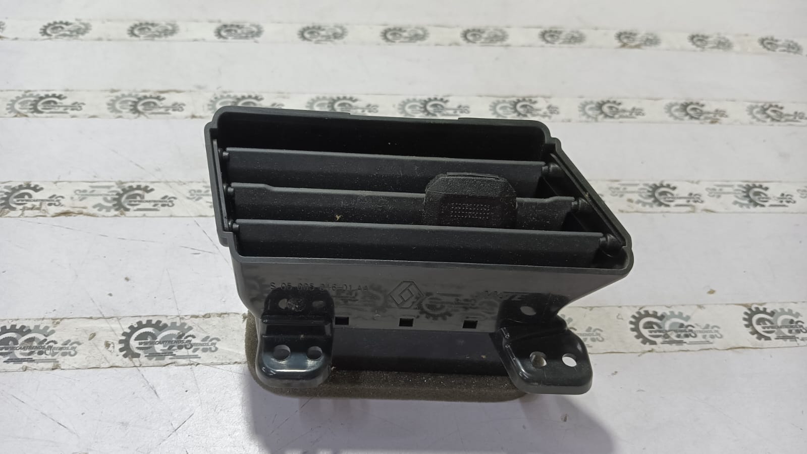 Nissan instrument panel vent with black plastic grille and adjustable louvers, designed for Nissan vehicles.